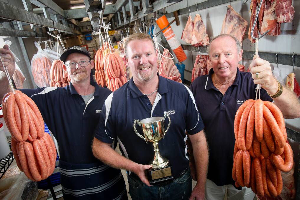 FAMILY AFFAIR: Matt, John and Ray Hastie at their store in Wollongong. The butchers won 1st place for the Traditional Australian category Beef at the 2018 AMIC National Sausage King competition. Picture: Adam McLean