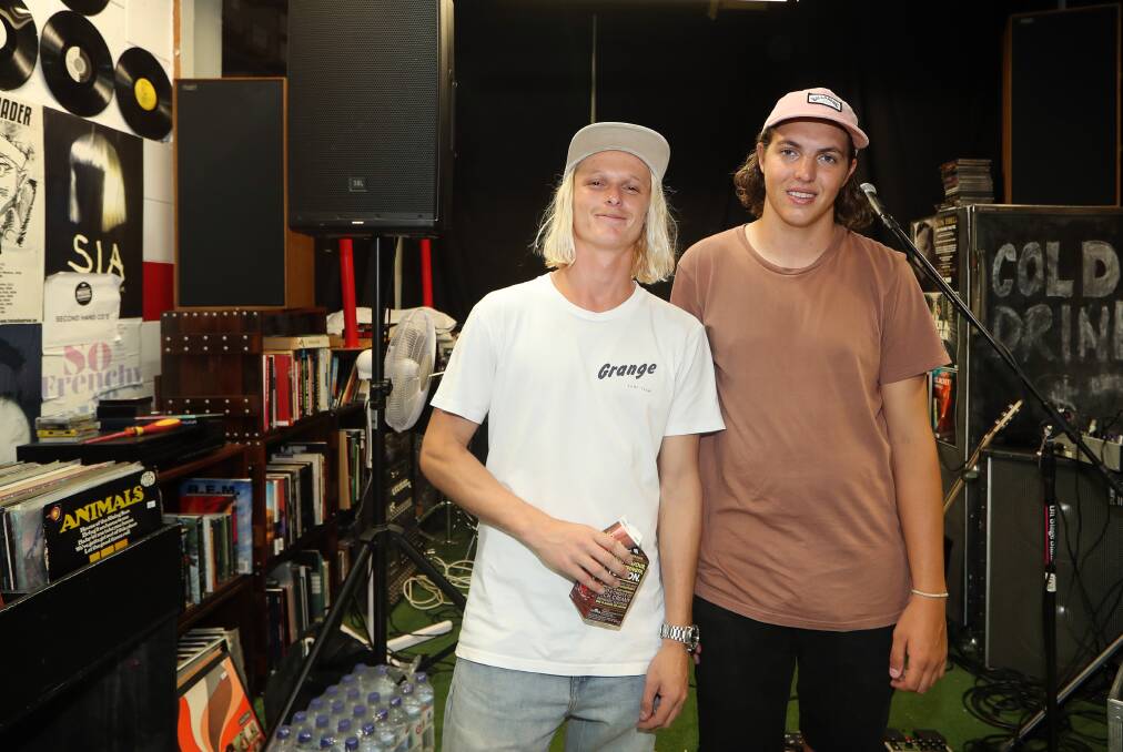 ROCK STAR: Billy Fleming and Zach Stephenson before playing a free concert to hundreds at Wollongong's Music Farmers record store on Wednesday. Picture: Sylvia Liber