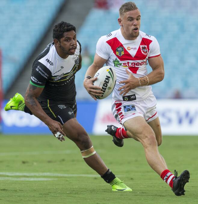 STANDOUT: Matt Dufty breaks into the clear in the Dragons 24-18 win over Hull at ANZ Stadium. Picture: AAP