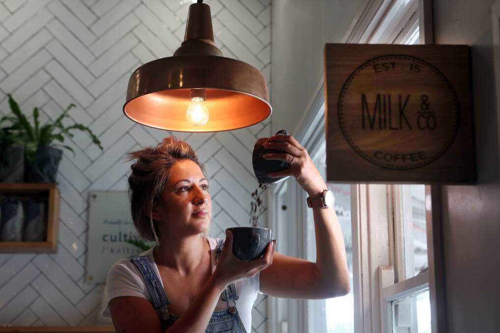 Kylie Stylianou, owner and head barista at Milk and Co Coffee in Yallah. She believes the perfect coffee comes down to getting the grind size right, the milk texture and the temp right, the cleanliness of the machine and the right beans. Picture: Sylvia Liber