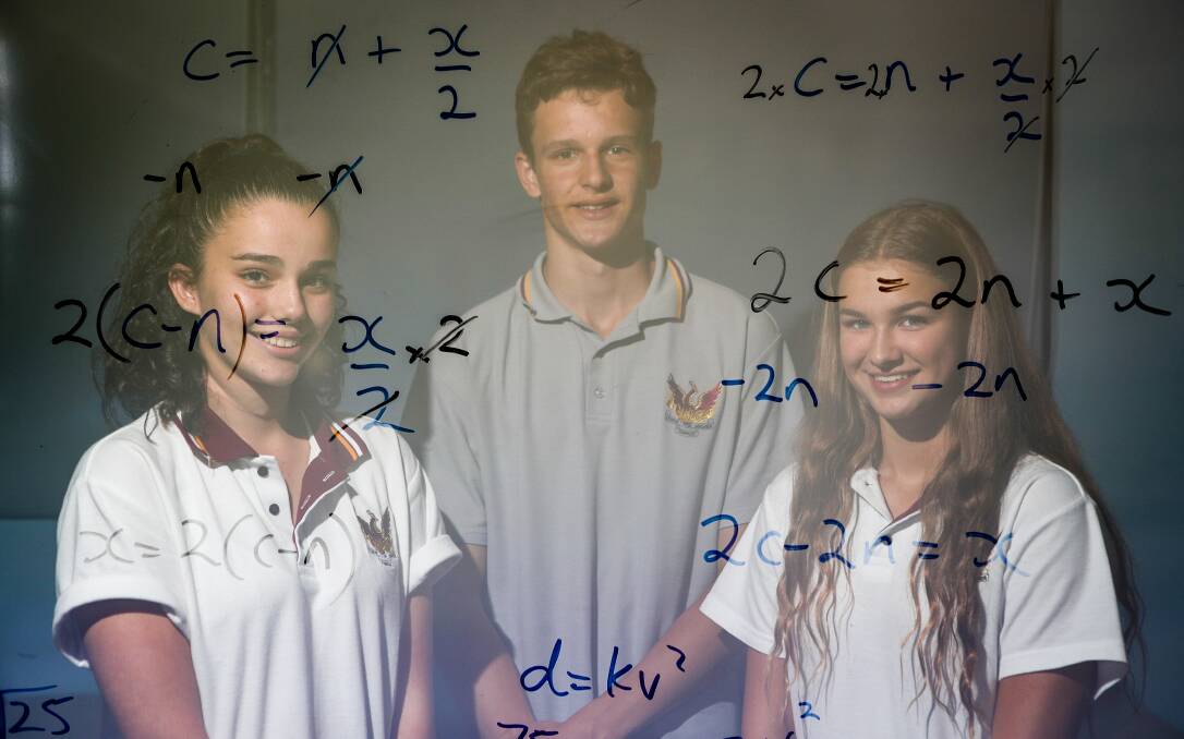 Double exposure image of year 10 Dapto High School students ​Caycee Kederer, Brandon Troth and Isabella Carlson. Dapto recorded impressive numeracy scores in the 2017 NAPLAN tests. Pictures: Adam McLean