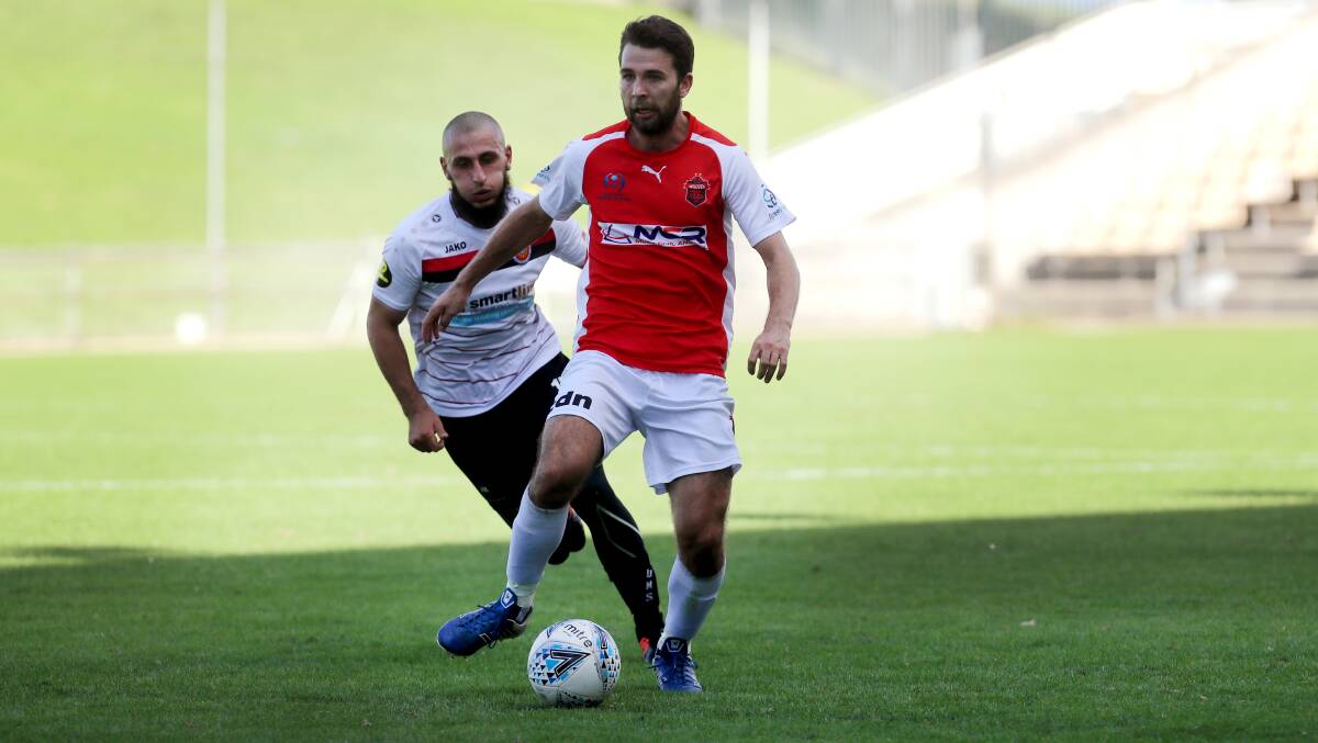 ON THE ROAD: Wollongong's Ryan Ensor and his teammates will travel away to face Sydney FC in round three. Picture: Sylvia Liber.