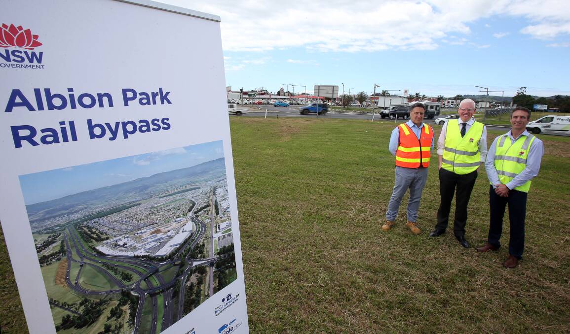 Getting closer: Fulton Hogan Albion Park Rail bypass project manager Matthew Saviana, Kiama MP Gareth Ward and RMS senior project manager Adrian Rouse at the northern end of the project. Picture: Robert Peet