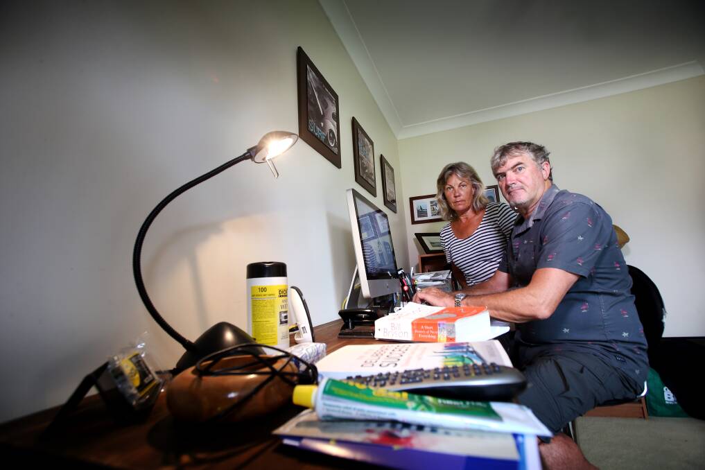 Richard and Meredith Bryce at home in Shellharbour. They say they are frustrated at Telstra's internet service melting down every summer. Picture: Sylvia Liber