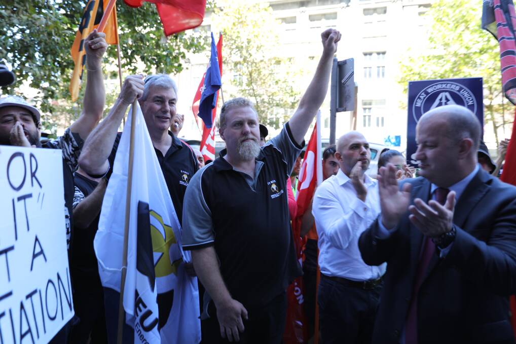 WRONG PLACE FOR A FIGHT: Union members and PKCT workers protest yesterday.