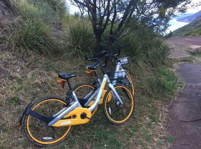 EASY RIDER: The oBikes at the Otford lookout earlier in the week. Picture: PHIL PRESTON.