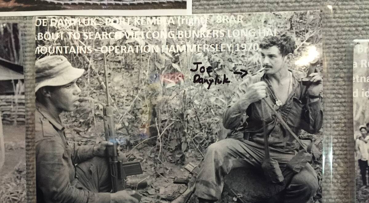 Port boy: This photograph shows Port Kembla's Joe Danyluk about to take part in operations to search Viet Cong bunkers in the Long Hai mountains. Picture: AWM