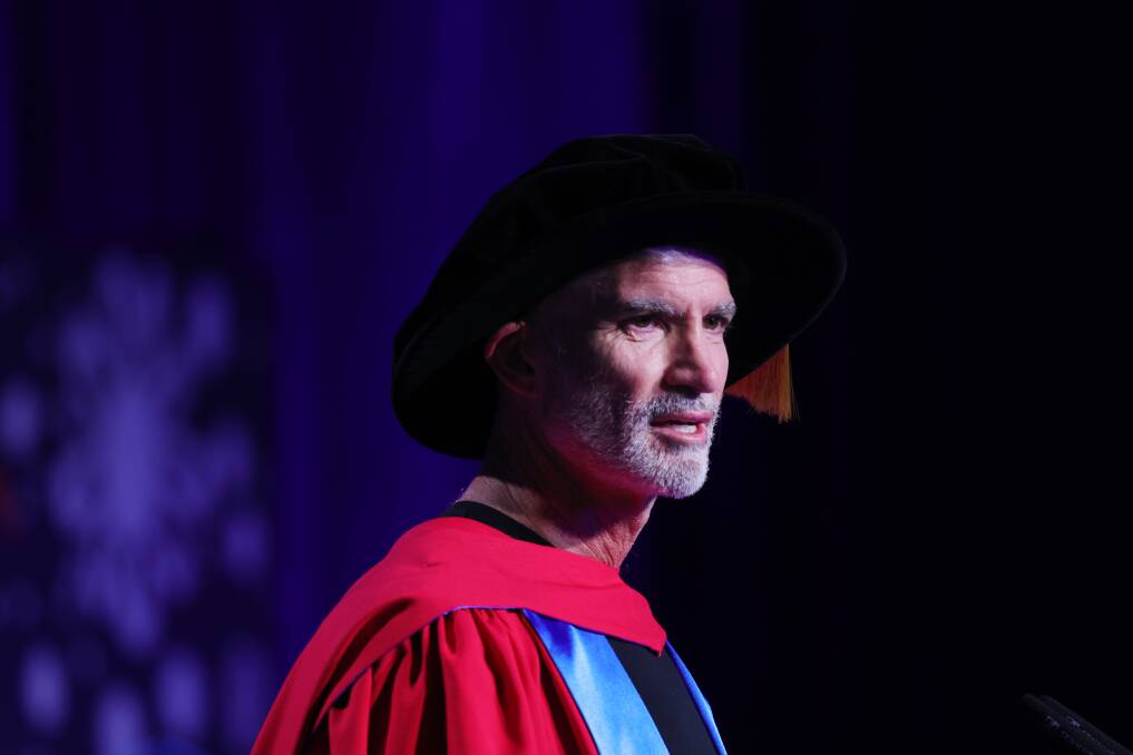 Craig Foster speaks at the UOW Faculty of Business and Law graduation ceremony on Tuesday, April 16. Picture by Sylvia Liber