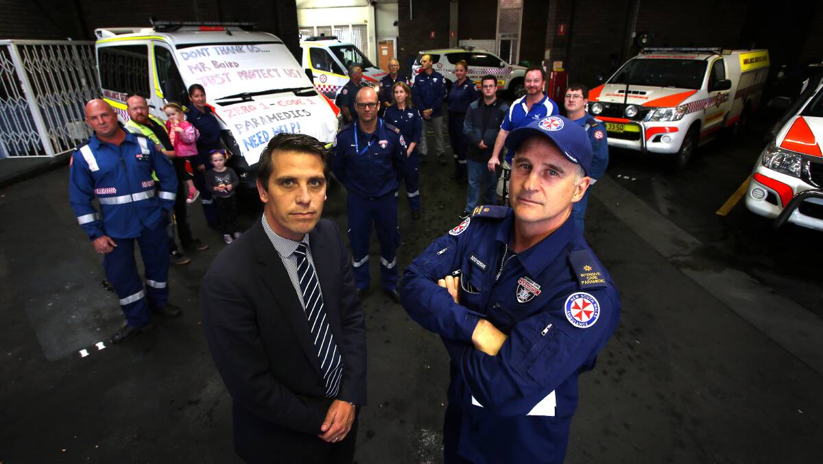 A fair go: Keira MP Ryan Park, Illawarra paramedic and HSU delegate Anton Jamsek and fellow paramedics oppose changes to their insurance cover. Picture: SYLVIA LIBER