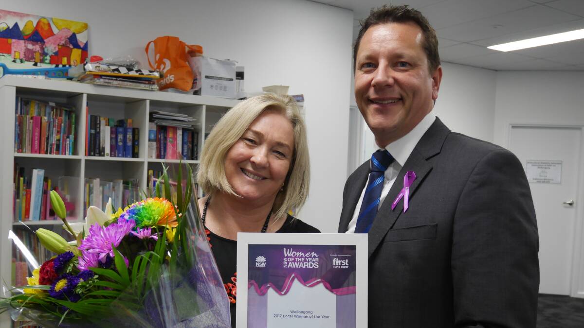 Julie Mitchell with Wollongong MP Paul Scully who presented her with her award on Friday morning.
