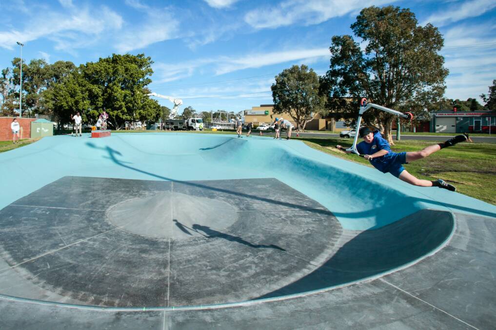 Scooter riders enjoy the new Unanderra skate park. Picture: Adam McLean