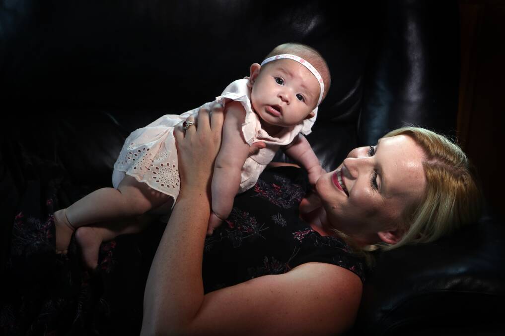 Welcome delivery: Anneliese Chapman with baby daughter Scarlett-Rose who happened to be born on Australia's most popular birthday - September 17. Picture: Georgia Matts