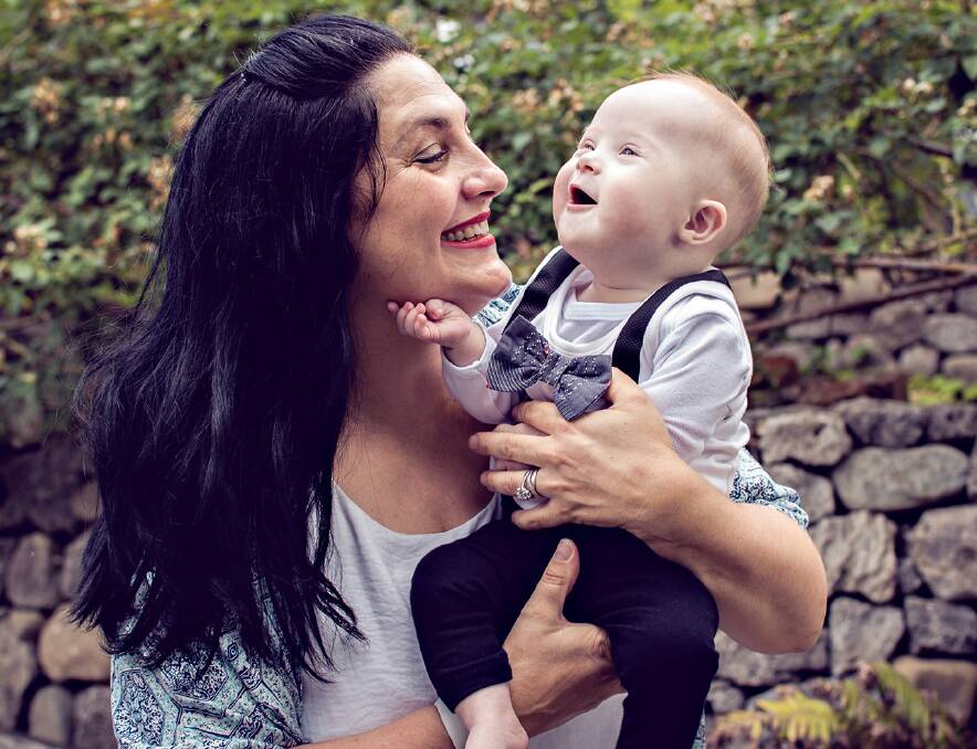 Bundle of joy: Figtree's Stephanie Rodden with her 12-month-old son Lincoln, who has made her family "complete". With World Down Syndrome Day to be celebrated on March 21, she's calling for more support for parents when their baby is diagnosed.