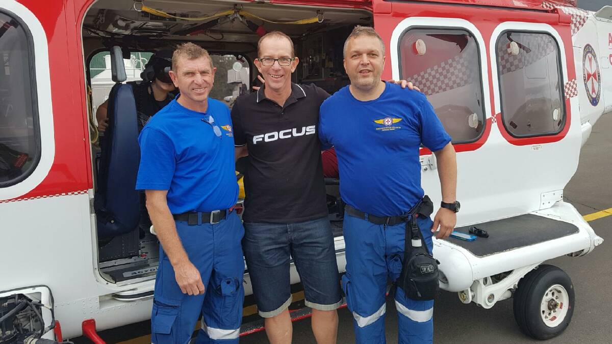 Gratitude: Pat McGill gave thanks to two of his saviours - rescue helicopter paramedic Wayne Cannon and doctor Kent Robinson - on the weekend.