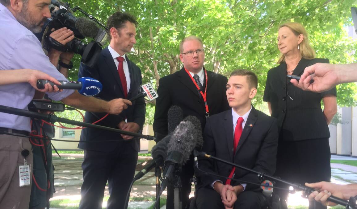 Advocate: Towradgi's Ben Oakley outside Parliament House on Wednesday with his father Michael, Throsby MP Stephen Jones and Cunningham MP Sharon Bird.