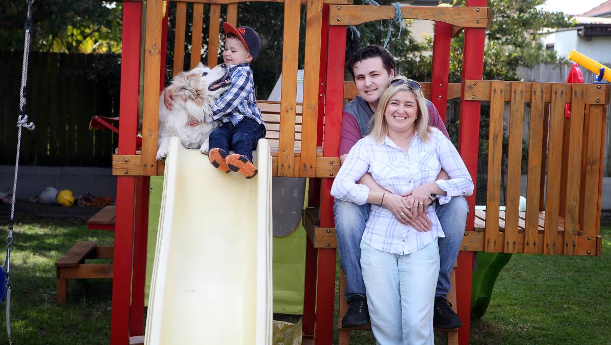Riley Bowyer, with parents Melissa and Adam, and dog Chez. Picture: Sylvia Liber