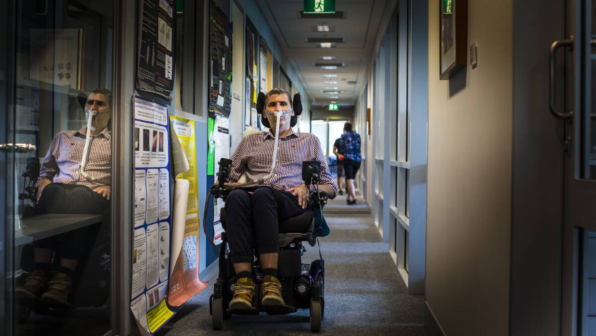 The progression of MND means Dr Justin Yerbury can now only move his head, face, eyes and left foot. Picture: Paul Jones