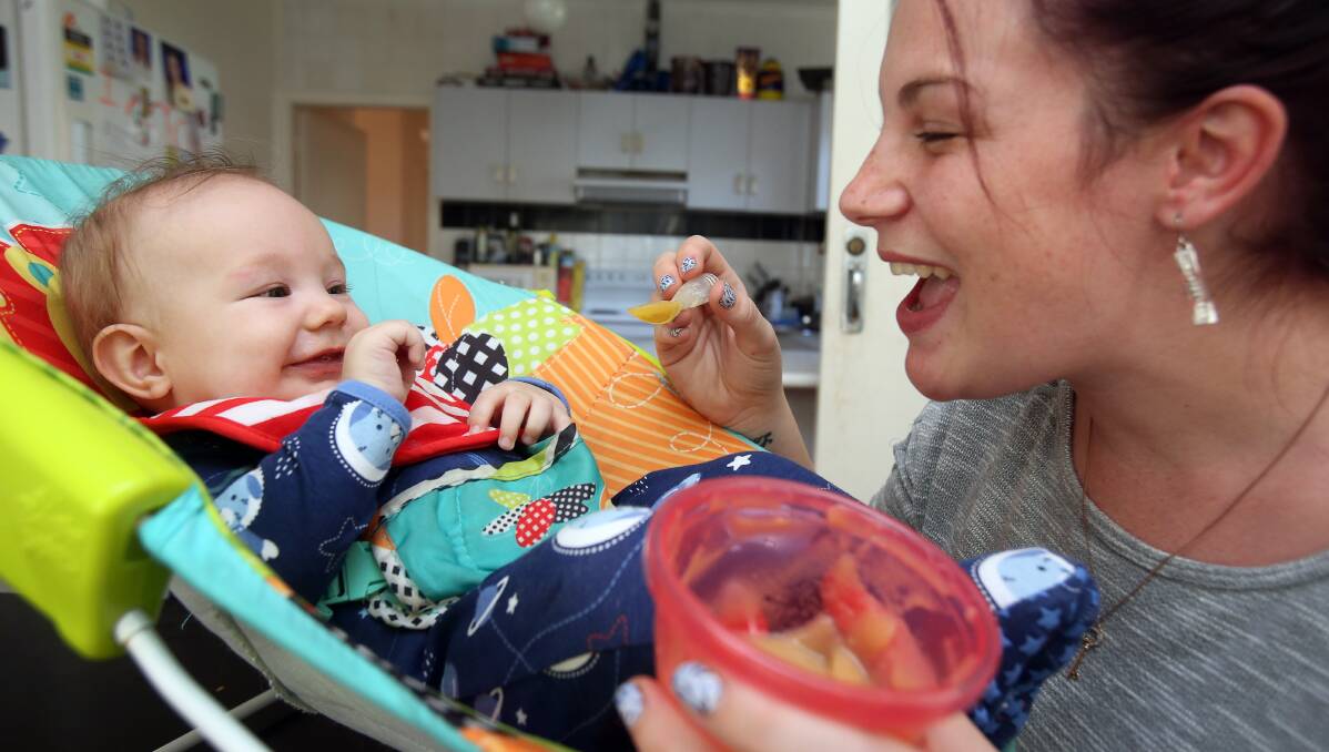 Food for thought: Clare Jessop with her five-month-old son Levi who is thriving since she introduced solids one month ago. Picture: Robert Peet