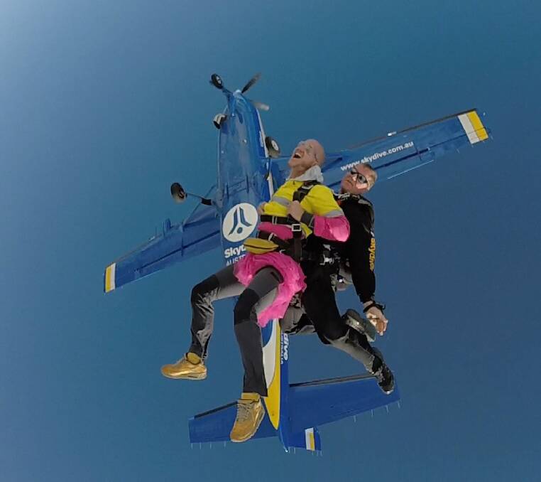 Mid air: Kemmrich took the challenge in a pink tutu to support breast cancer research. Aerial pictures: Skydive Australia