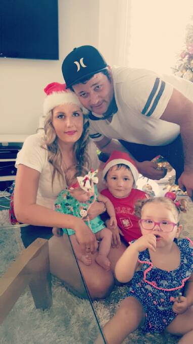 Staying strong: Wollongong parents Charlene and Justin Ebbs with their children - Kalani, seven months; Kallen, 5; and Khaleesi, 2.