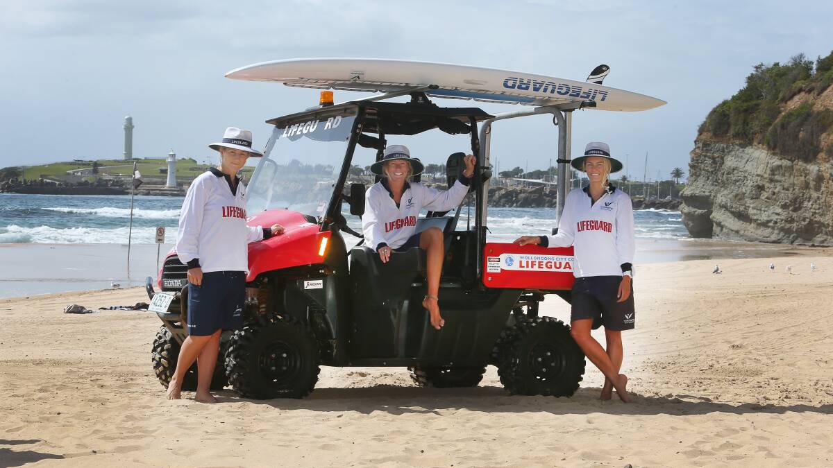 On patrol: Wollongong City Council lifeguards Jamie Brinkworth, Holly Lane and Maeve Kennedy at North Beach. Picture: Robert Peet