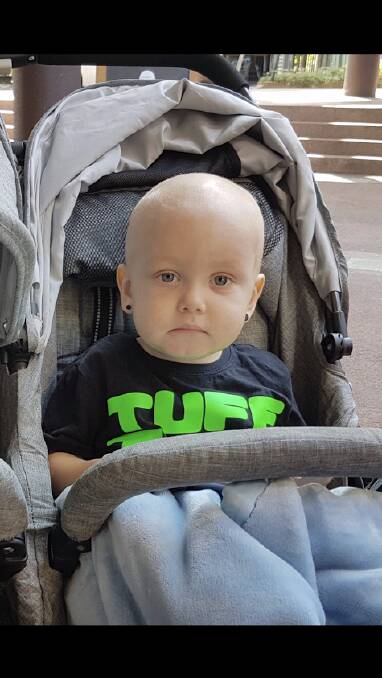 Long journey: Two-and-a-half year old Tyde has lost his blonde locks after chemotherapy - but not his fighting spirit which he will need over two years of treatment.