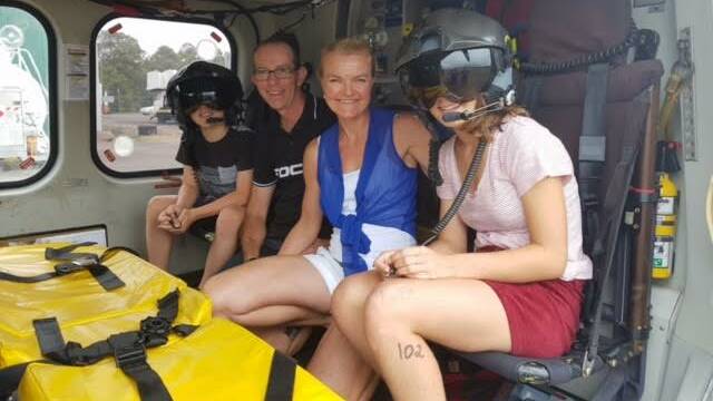 Pat McGill with wife Geraldine, and children Nicholas, 9, and Keira, 12, during their visit to the Albion Park Rail rescue helicopter base last Sunday.