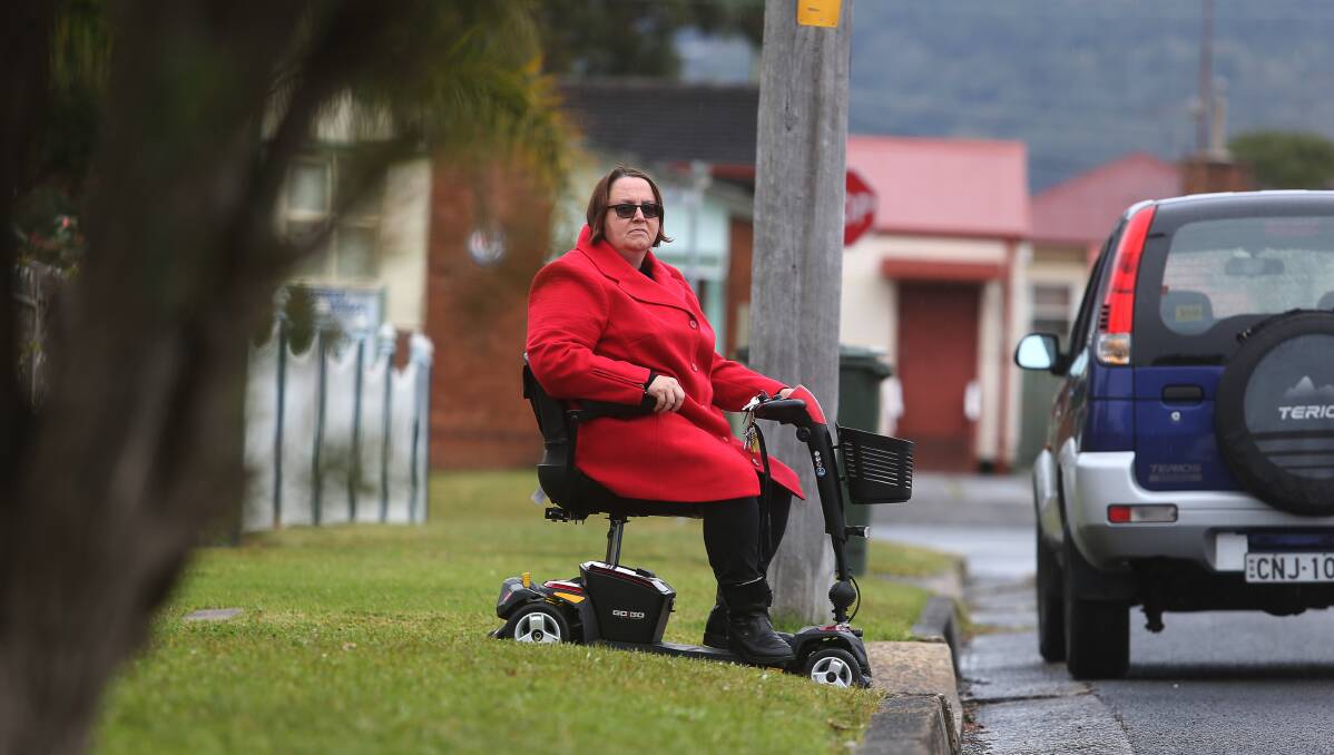Towradgi resident Nina Crumpton was upset after a bus driver refused to let her come aboard with her micro scooter on Saturday. Picture: Robert Peet