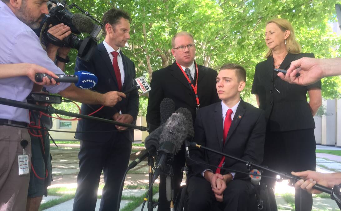 Advocate: Towradgi's Ben Oakley outside Parliament House with father Michael, Throsby MP Stephen Jones and Cunningham MP Sharon Bird. 