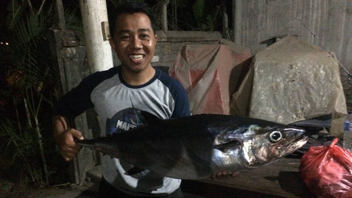 Bali beauty: Agus Bailli with a dog tooth tuna from the waters off Bali. (Photos submitted for publication should be high res - at least 1MB)