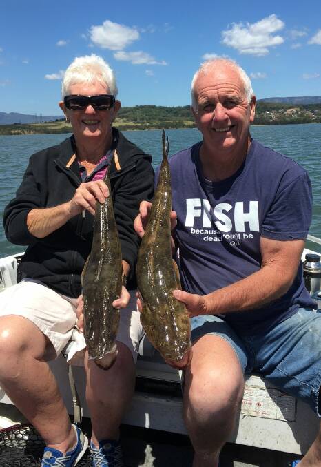 Dinner time: Siblings Barbara and Pat Murphy with some very tasty Lake Illawarra flathead from last weekend. The weather is looking good for fishing this weekend.