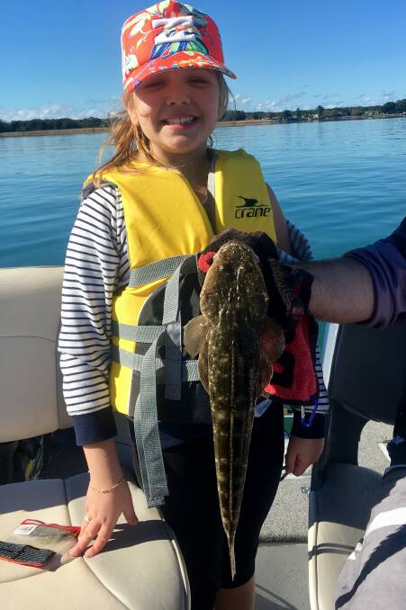 Great catch!: Petite Summa Wardman with a nice Lake Illawarra flatty she caught using a jigged plastic.