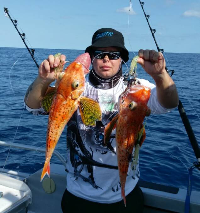 From the depths: Steve Banks with a pair of monster gurnards taken while fishing at 200 fathoms depth.