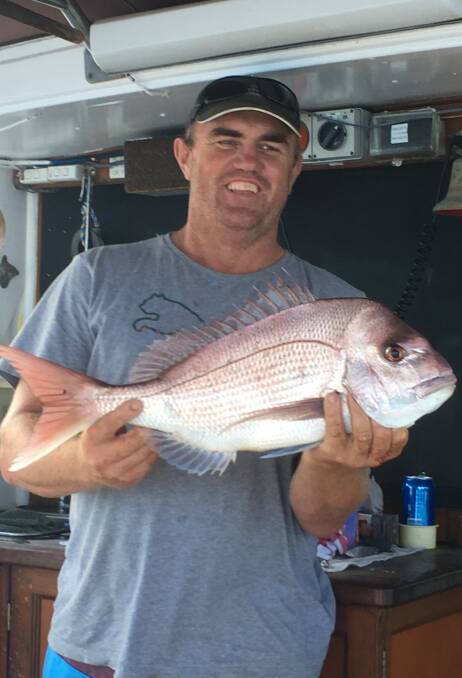 Chris from Banfield Constructions with a fine Kiama snapper.
