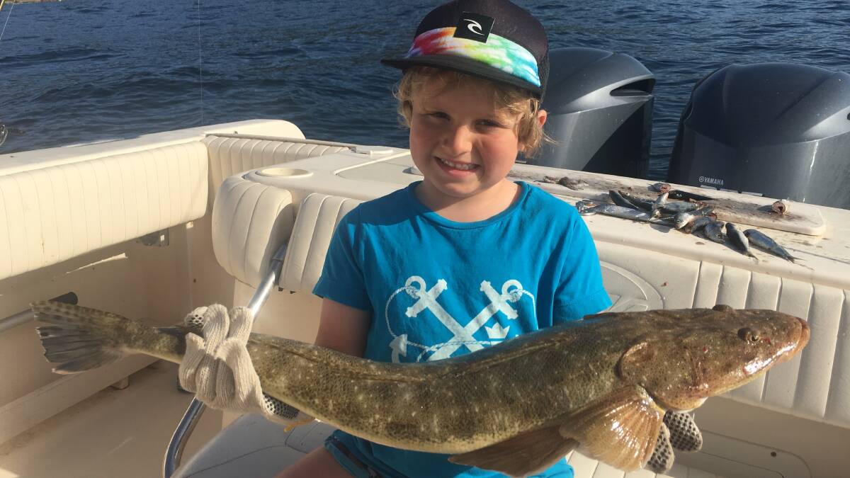 Great catch!: Ashton Mekisic with a 74cm flathead from up off Coledale. Flathead, bream and whiting have been biting off many Illawarra beaches. 