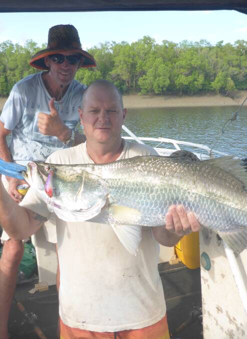 Adrian Hands and Mark Mittelstadt with Mark’s barramundi from the NT.