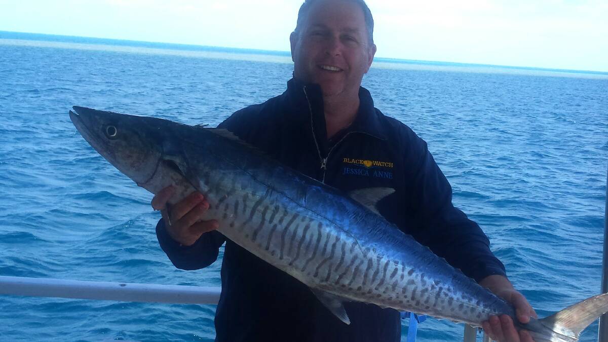 Holy mackerel!: Mark Coles travelled to Swaines Reef to haul in this Spanish mackerel. (Photos submitted for publication should be high res - 1MB)