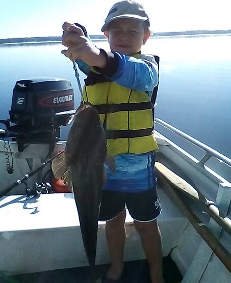 Zac Szakaas with a 55cm flathead he caught at Sussex Inlet recently.