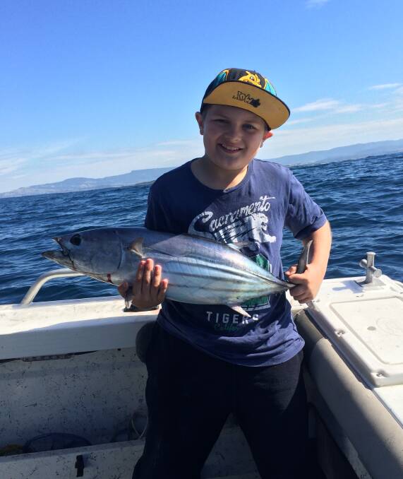 In a spin: Mason McDonough used his spinning reel to catch this striped tuna off Shellharbour.