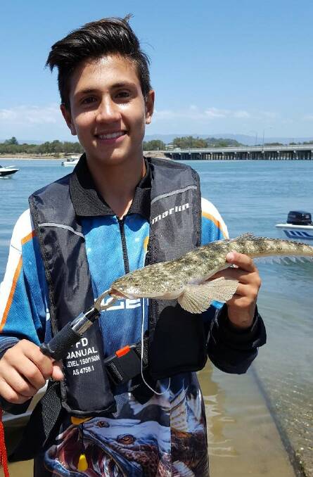 Jackson Tikkeros with a nice Lake Illawarra flatty he caught recently.