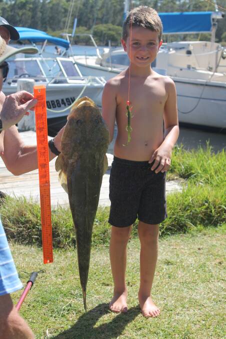 Great catch!: Connor Watt, 7,  with his 82cm flatty from Sussex Inlet.