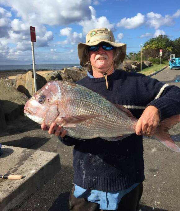Henry Wedderman with a solid Bellambi snapper he caught recently.