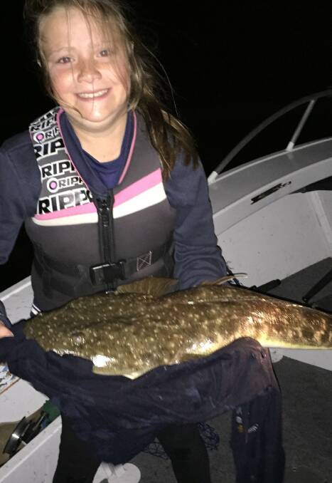 Well caught: Mackenzie Best with her 91cm flatty she caught and released in Lake Conjola last weekend.
