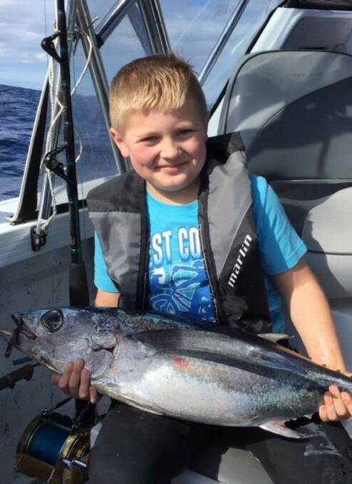 Young Mason McDonough joined the big boys out wide to catch this albacore.
