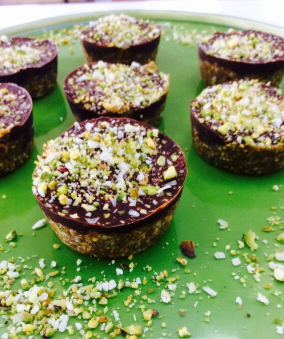 Sweet treat: Figs and pistachio cups with a drizzle of dark chocolate. The perfect treat to serve up at your next dinner party.