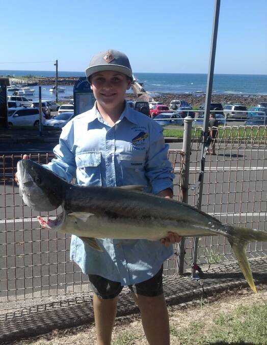 King of the kids: Tyler Jackson with a solid kingfish from the inter pub comp between Warilla and Ocean Beach hotels.