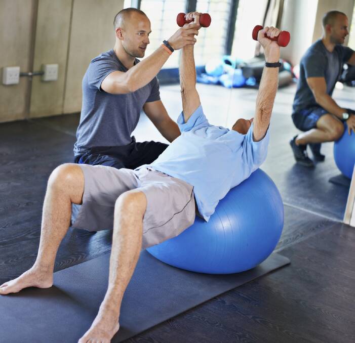 Help at hand: A personal trainer may be able to help you achieve your fitness goals.