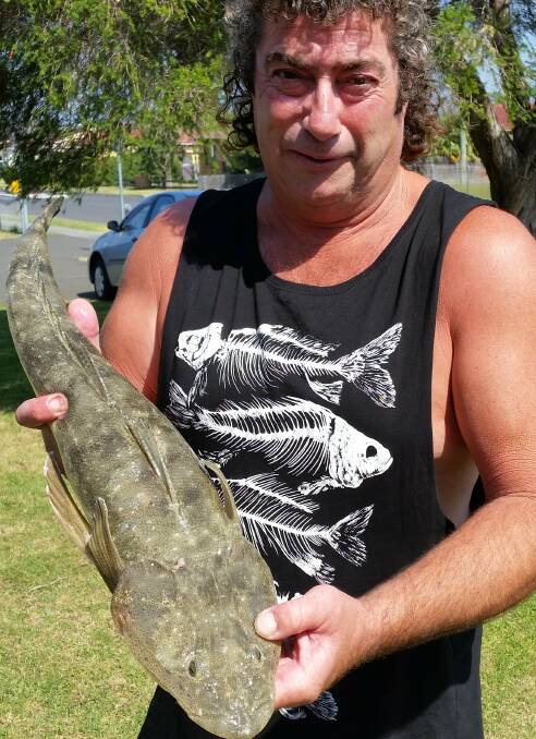 Warilla Hotel FC Danny Colville with a 1.95 kilo flatty caught recently.