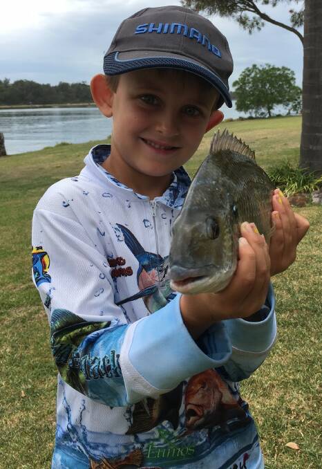Young gun: Lucas Quinn, at six years old, fished Minnamurra River last week for this excellent bream.