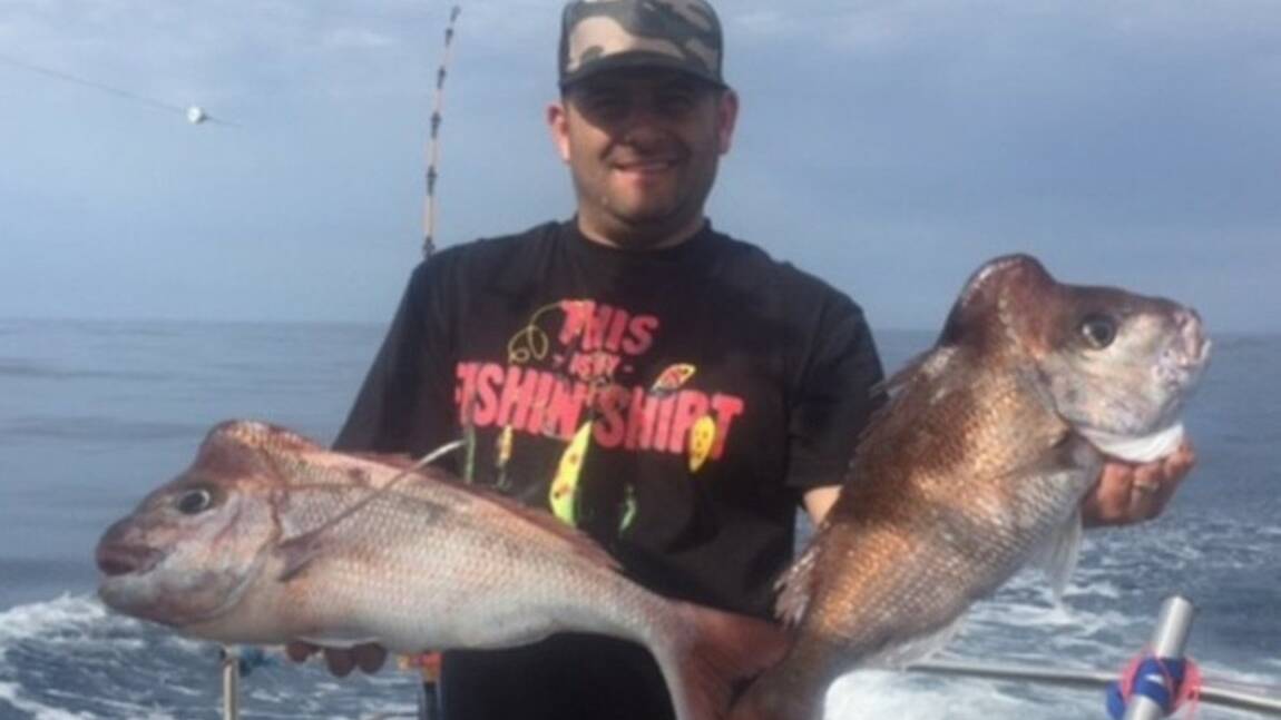 Red alert: Nick Sergi with a pair of Kiama snapper from last weekend. The reddies seemed to fire up again last week with quite a few fish coming from the deeper reefs.